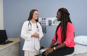 Woman visiting a physician