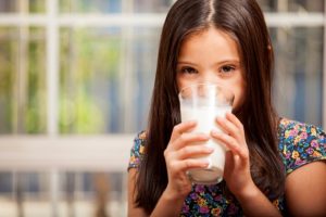 girl drinking milk