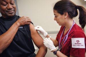 man getting a vaccination