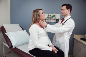 Pregnant woman visits doctor