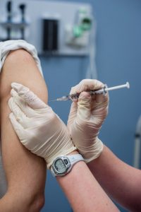 Person getting vaccination shot