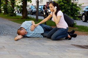 Woman calling an ambulance for patient