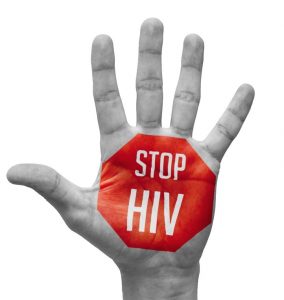 Hand with stop sign that says STOP HIV