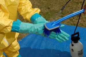 Person cleaning gloves