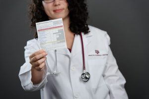 Doctor prescribing treatment