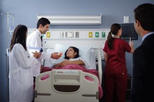 Doctors visiting patient