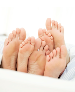 Signs and Symptoms of Diabetes/3 Pairs of Feet Photo