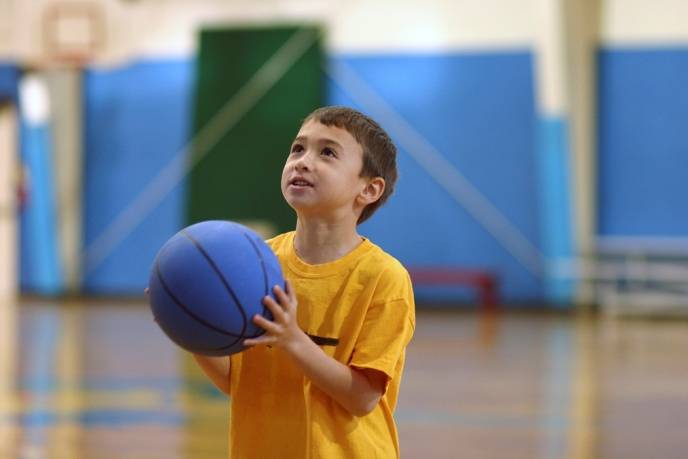 Kids Corner/Boy Holding Basketball Photo