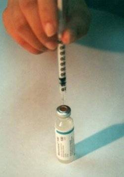 High Blood Sugar/Insulin Bottle with Needle Inserted Photo