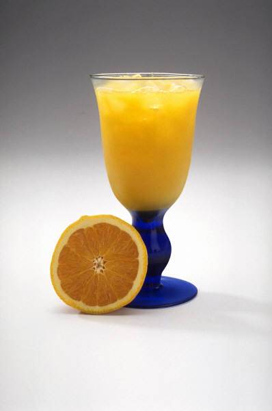 Exceptional Times/Orange and Glass of Orange Juice Photo