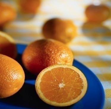 Meal Planning/Oranges with 1 Cut in Half Photo