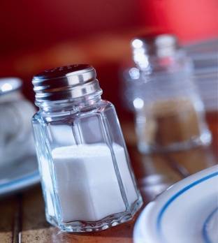 Daily Self Care/Salt Shaker on Table Photo